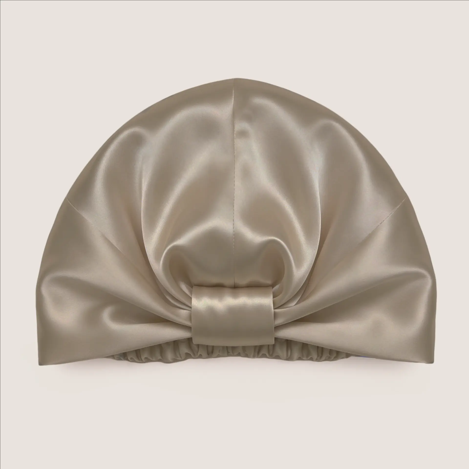 Gorro de seda en gris dorado, vista frontal
