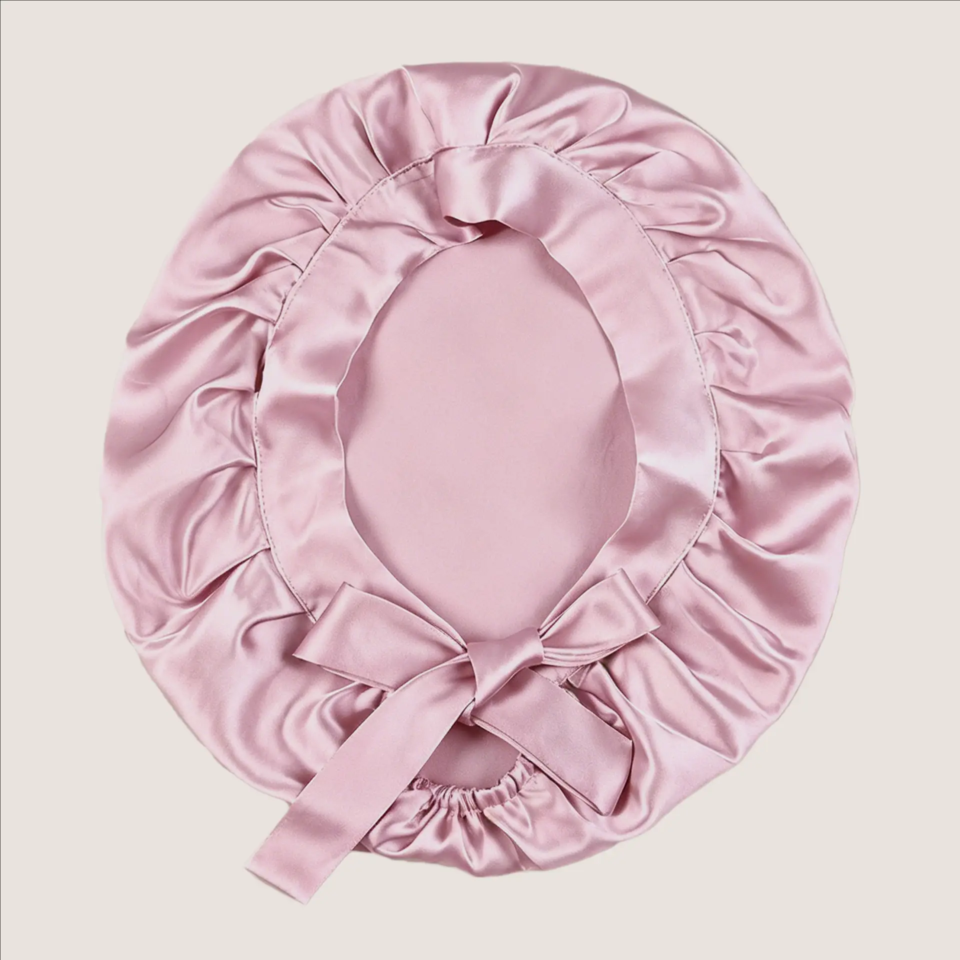 cuffia da notte in morbida seta di gelso color rosa loto