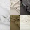 Colores de las fundas de cojín Sensoire de lino francés: blanco, natural, carbón, raya fina, oliva y raya oliva