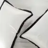 Elfenbeinfarbene Kissenbezüge aus Maulbeerseide mit schwarzen Konturrändern, Noir Contour